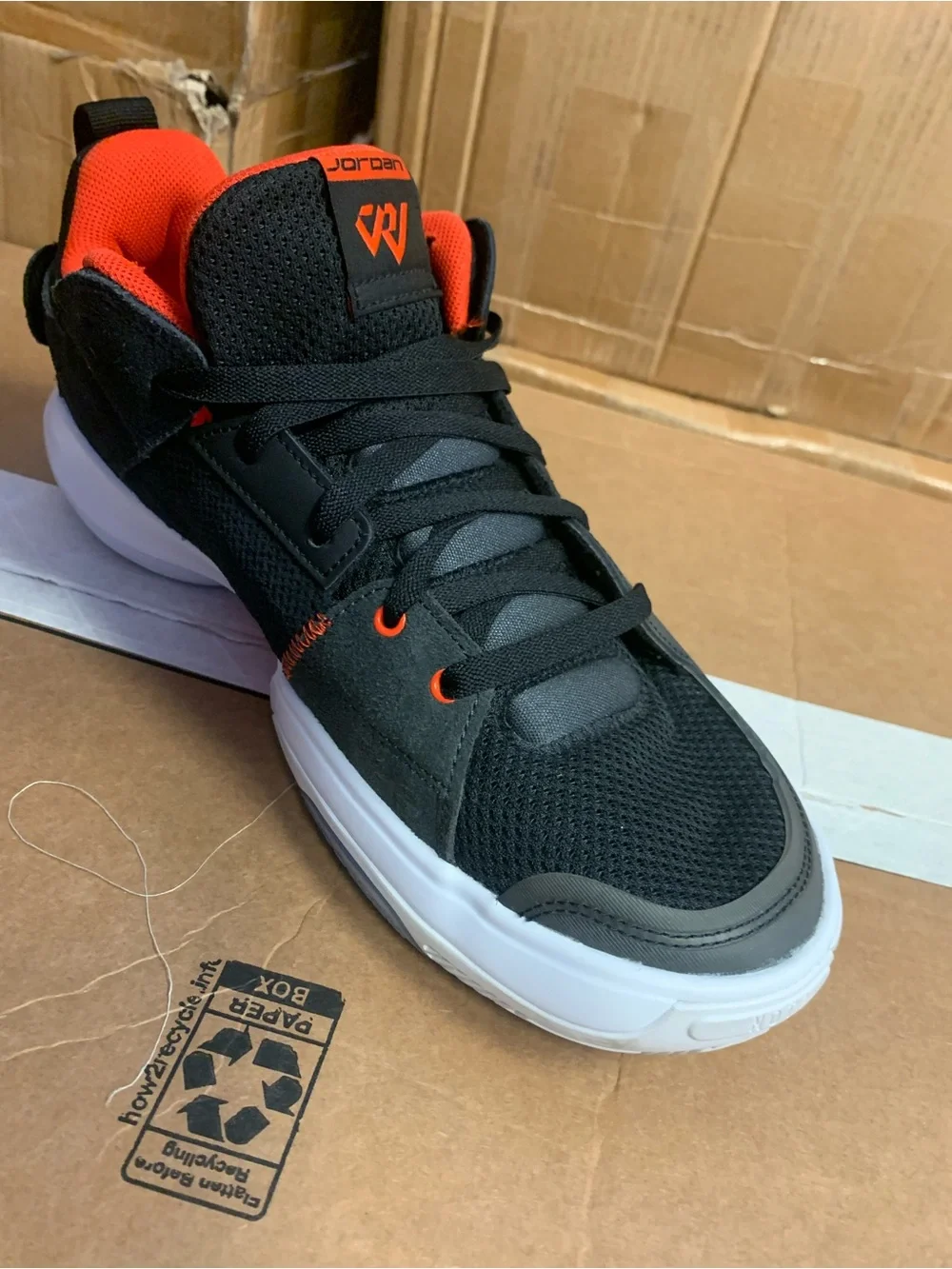 Jordan Black and Orange Low-Top Sneaker for men